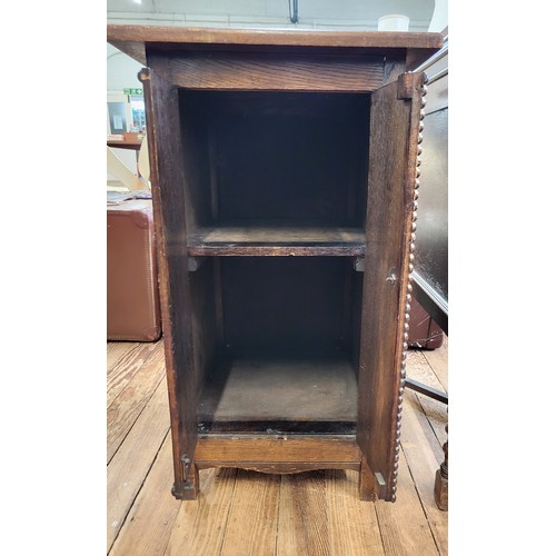 30 - A decorative oak cabinet 79cm x 45cm x 50cm.