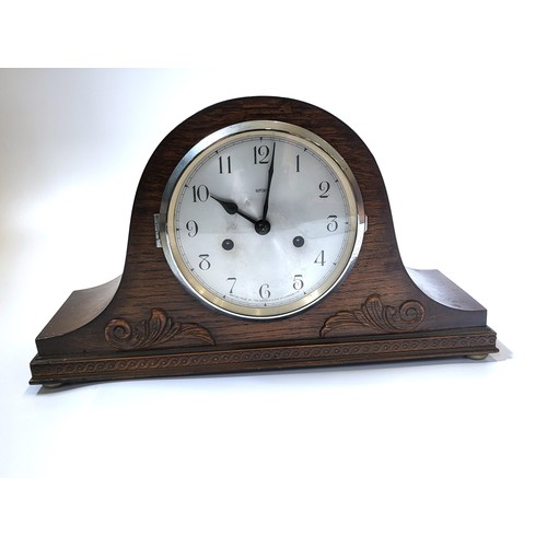 62 - A Napoleon clock 'Made specially for Dubros Stores' 22cm x 41cm x13cm.