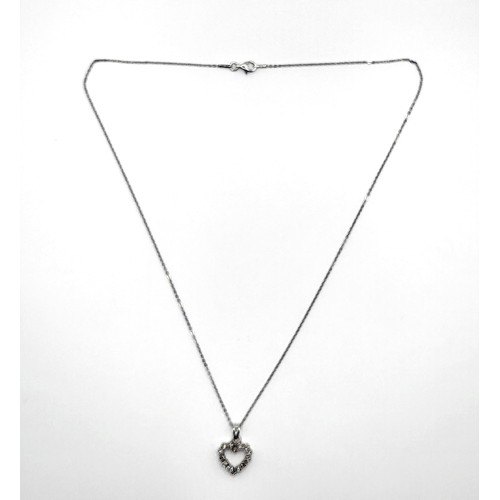 363 - An 18ct white gold (stamped 750) diamond set heart on a silver chain 46cm, 3.2gms boxed.