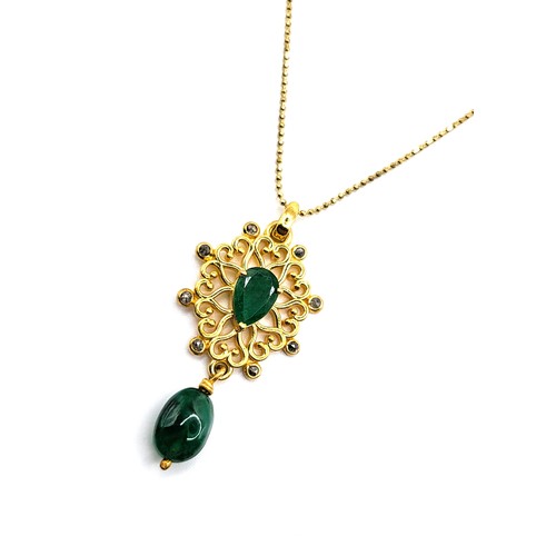 383 - A fancy pendant in yellow metal set with diamonds, a pear-shaped emerald, a suspended polished emera... 