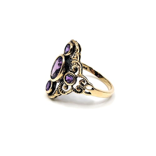 397 - A 9ct yellow gold amethyst Art Deco style ring size N 4gms