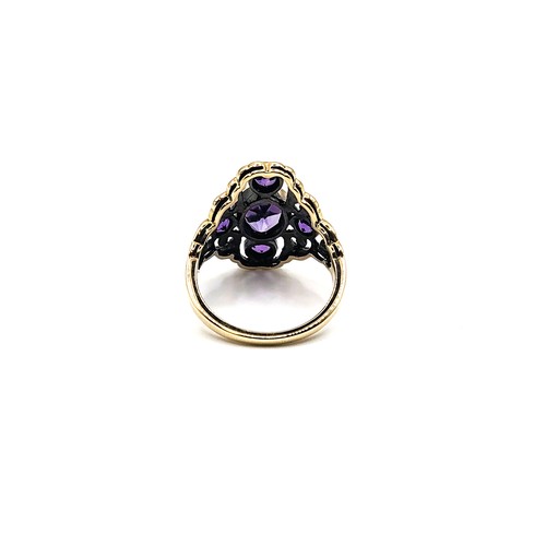 397 - A 9ct yellow gold amethyst Art Deco style ring size N 4gms