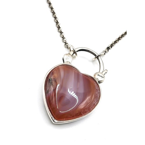 404 - A stamped silver and banded agate heart shaped pendant on a belcher link chain (unmarked) 44cm. 12.9... 