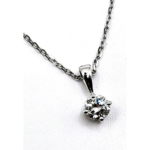 405 - A 9ct white gold and diamond single stone pendant trace link necklace of 30 points. 1.5gm. 44cm.