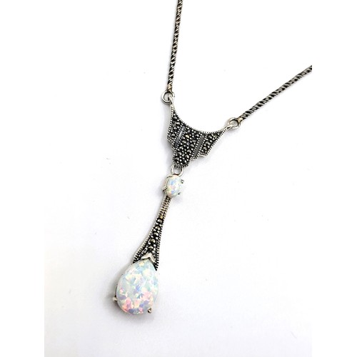 409 - A silver (stamped 925) marcasite and opal  pendant 6cm drop on a silver (stamped 925) rope chain 40c... 