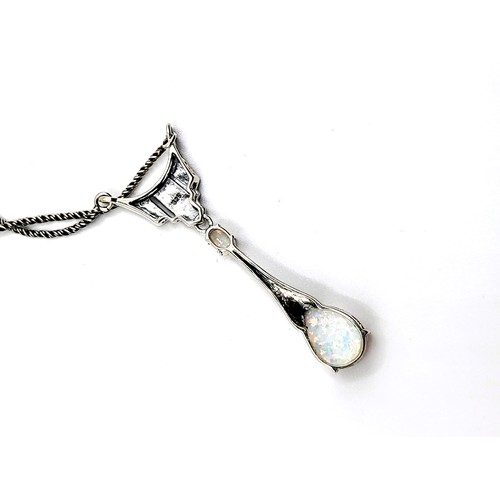 409 - A silver (stamped 925) marcasite and opal  pendant 6cm drop on a silver (stamped 925) rope chain 40c... 