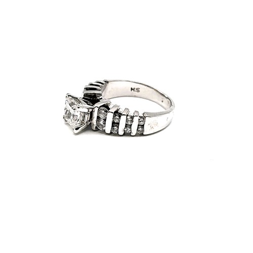 410 - A 14ct white gold (stamped) diamond dress ring, with a central approximately 1.0ct princess cut diam... 