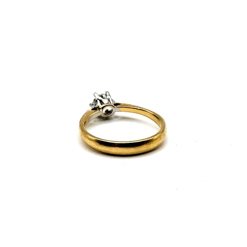 414 - An 18ct yellow gold (unmarked) round cut brilliant diamond solitaire  ring. Weighing an estimated 0.... 