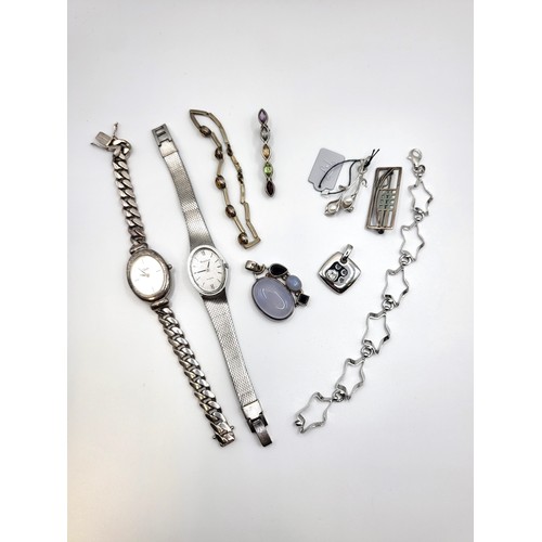 431 - A silver bracelet set with citrines, a silver star bracelet, a silver and pearl brooch, a modern Car... 