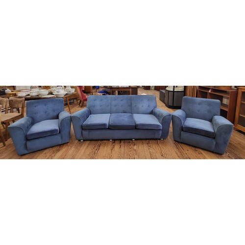 3 - A blue mid-century button back three-piece suite comprising of a three-seater settee (82cm x 200cm x... 