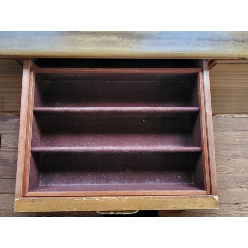 1 - A mid-century 'Alfred Cox' sideboard with three drawers (top one being for cutlery), and flanked by ... 