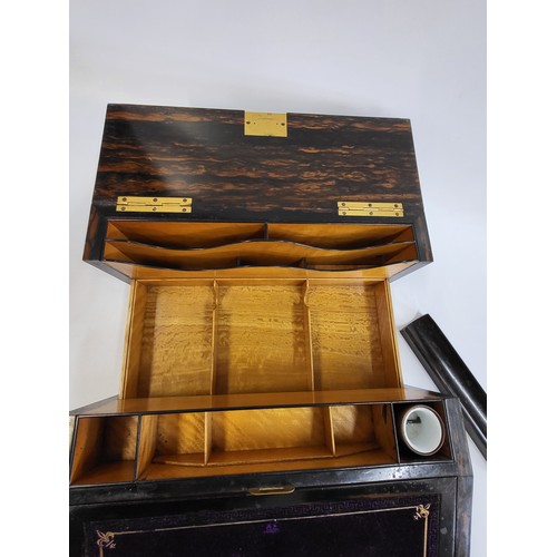 18 - A coromandal wood writing slope with purple velvet insert for writing, a push-button/ spring mechani... 