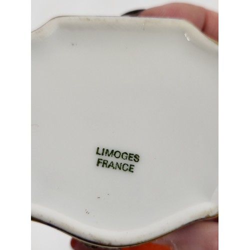 217 - A collection of nine Limoges patch boxes.