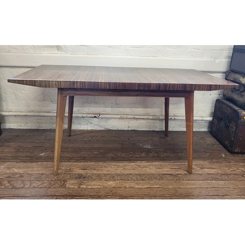 4 - A mid-century design extending dining table