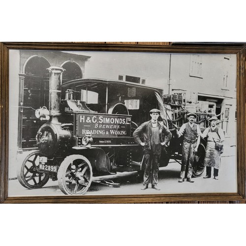 92 - A photo of a ship in dock at nighttime, a print of New London Docks and Passenger Office, and a prin... 