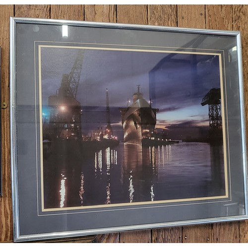 92 - A photo of a ship in dock at nighttime, a print of New London Docks and Passenger Office, and a prin... 