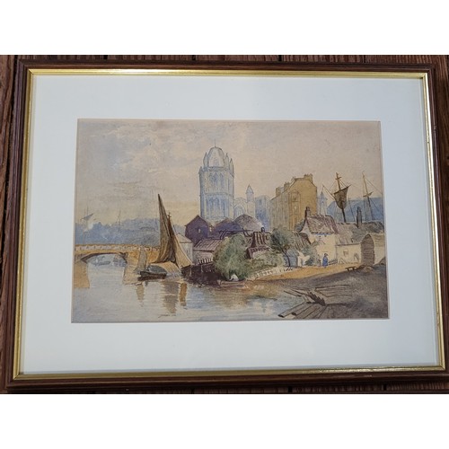 98 - A pair of watercolours: a coast scene with boats, and a river and town scene. Unsigned. Framed and g... 