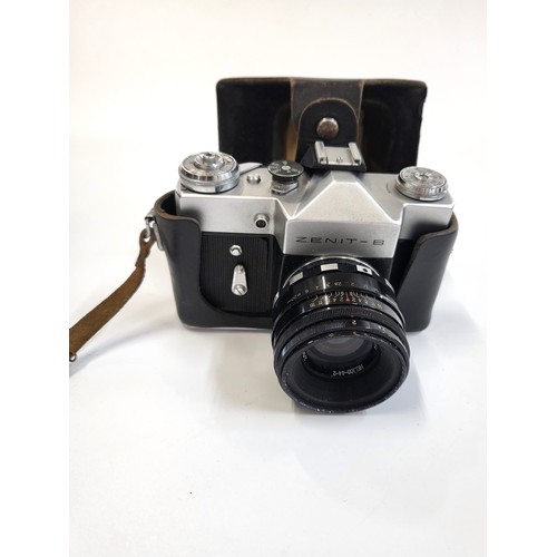 156 - Three cameras including a Zenit 8 35mm SLR with case, Beck Anastigmat with case, and a Cine Kodak-Ei... 