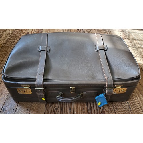 196 - A Madler brown leater suitcase with keys.