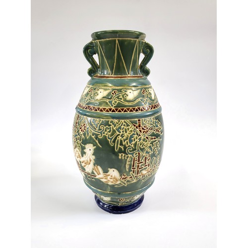 230 - A glazed pottery vase with cockrell, hen and chicks 47cm.