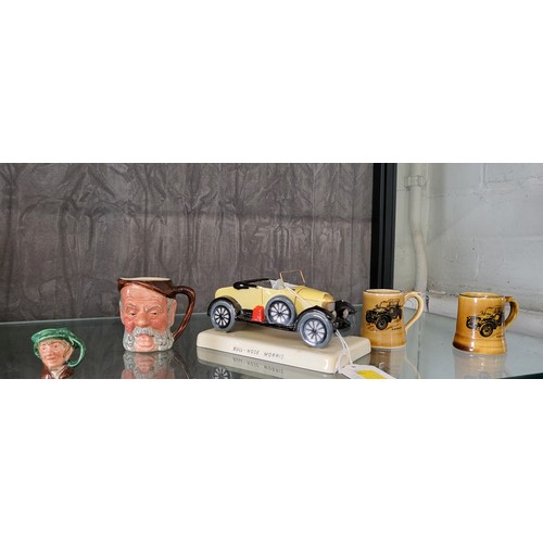 224 - Carlton Ware 'Quality First' Morris model, two Wade miniature tankards, a Sandland Ware character ju... 