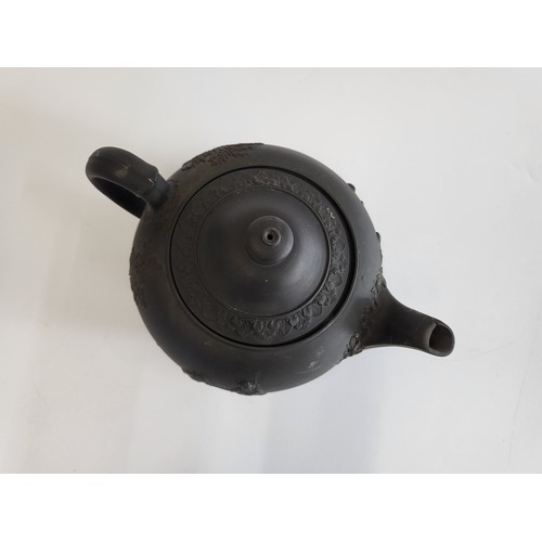 232 - Wedgwood black basalt tea pot and cover 21cm diameter.