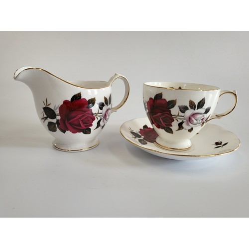 251 - A Colclough crimson rose pattern part tea service, four porcelain floral pattern plates with pink bo... 