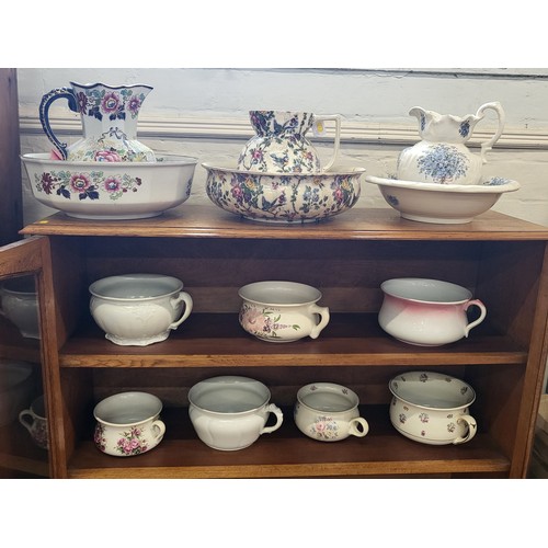 252 - A Mason's Ironstone jug with basin 41cm diameter, two jugs with matching bowls (one basin with glue ... 