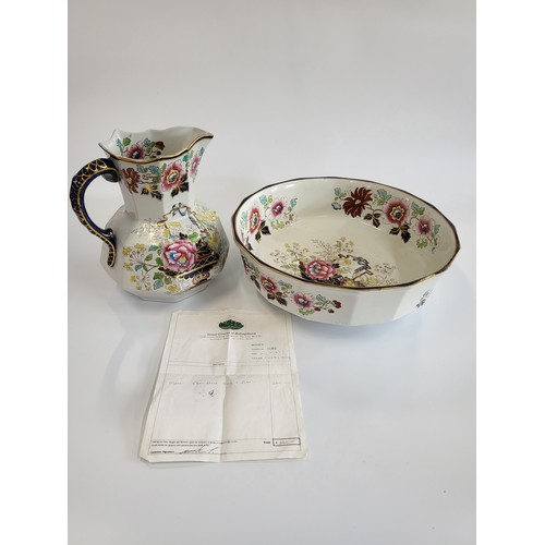 252 - A Mason's Ironstone jug with basin 41cm diameter, two jugs with matching bowls (one basin with glue ... 