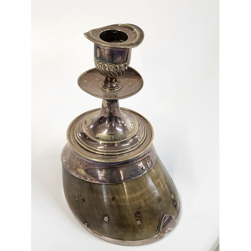 260 - A silver plate candlestick inscribed 'Greybie aged 27' on a shod horse hoof, has imperfections to th... 