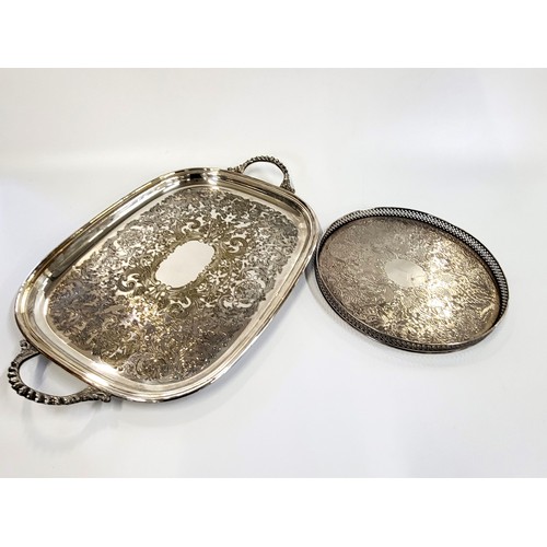 262 - A round 'Arthur Price' silver coloured tray with heavy foliate engraving and lattice edge 28cm diame... 