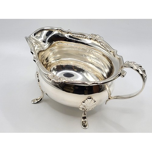 271 - A silver tea pot Docker & Burn Birmingham 1926, and silver cream jug and sugar bowl, Docker & Burn L... 