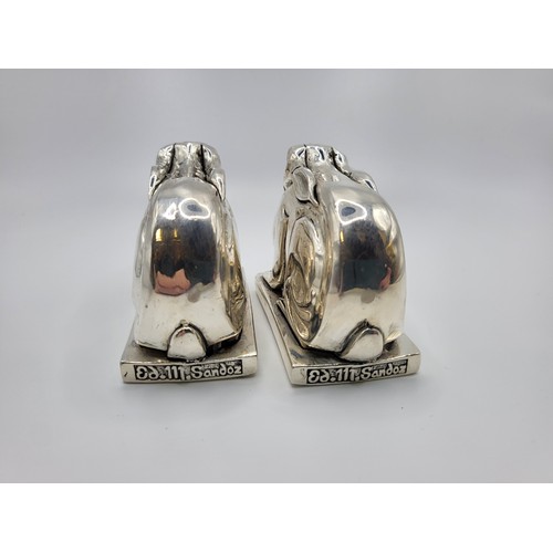 276 - A pair of rabbit condiments in the Art Deco style stamped 800 silver. Signed Sandoz. 5.5cm x 7.5cm. ... 