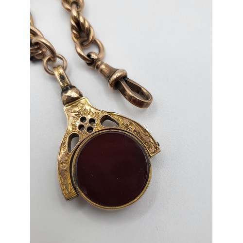 284 - An Albert rose gold watch chain with T bar and a double sided fob of Chalcedony and Carnelian set ha... 