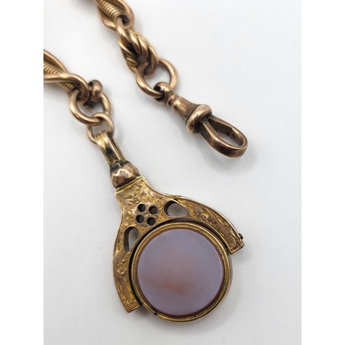 284 - An Albert rose gold watch chain with T bar and a double sided fob of Chalcedony and Carnelian set ha... 