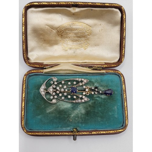 297 - An Art Deco diamond and sapphire brooch in gold (untested). Forty-seven diamonds graduating sizes fr... 