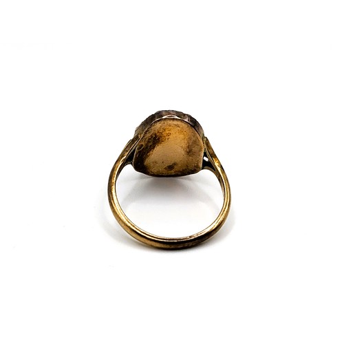 302 - A yellow gold (unmarked) scarab beetle ring. Size J 1/2  2gms.