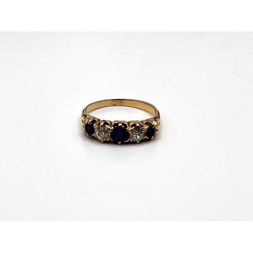 304 - A gold sapphire and diamond Victorian style ring