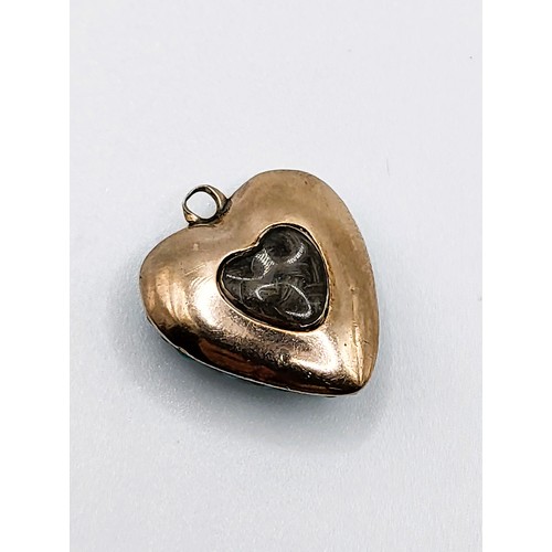 305 - A heart shaped gold locket with turquoise and Dutch rose diamond. 5gms. 2cm x 2cm