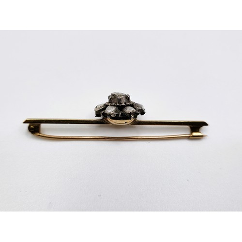 311 - A 9ct gold tie pin with eight Dutch rose/old cut diamonds 5cm x 1.5cm  4.3gms