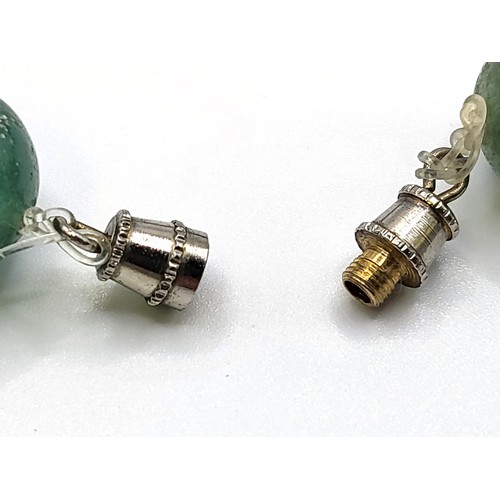 317 - A Jadeite necklace round beads 11.5mm, and a stainless steel screw clasp. 44cm. 85gms