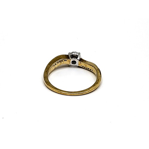 328 - 9ct yellow gold solitaire-style ring set with 0.22ct round brilliant cut diamonds in total, in a twi... 