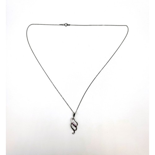 340 - A silver 'flame' pendant set with three tourmaline on a silver chain 46cm.  2.9gms.