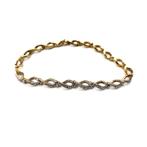 347 - A gold plated silver twist style bracelet set with diamonds, boxed. Diamonds 0.50ct approx. 8.8gms. ... 