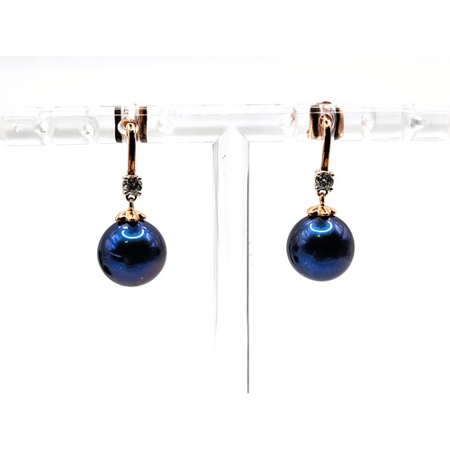 351 - A pair of 9ct rose gold iridescent 9mm dark pearl and round brilliant cut diamond drop earrings, box... 