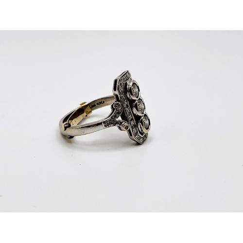 366 - An 18ct white gold diamond trilogy ring with diamond surround in an Art Deco style with a 9ct yellow... 