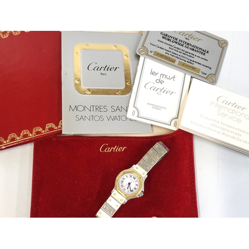 380 - A Cartier Santos Ladies Automatic 1980's watch with original pouch and paperwork detailing purchase ... 