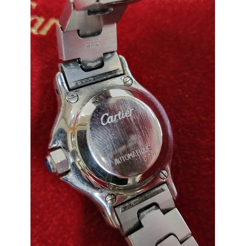 380 - A Cartier Santos Ladies Automatic 1980's watch with original pouch and paperwork detailing purchase ... 