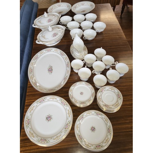 234 - Royal Doulton Alton service including plates, side plates, cake plates, cups and saucers, a platter,... 