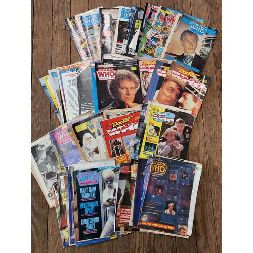 141 - A collection of Dr Who and Star Wars memorabilia including Dr Who magazines, cassettes, jigsaw puzzl... 